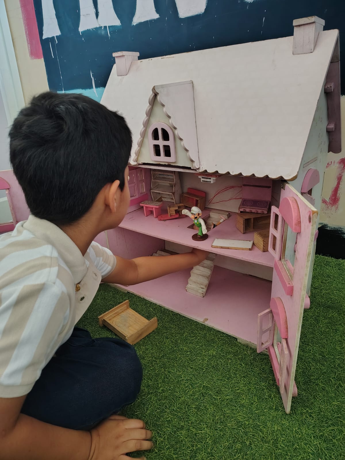 Hands-on learning activity at Aavishkaar — child engaged in structured play